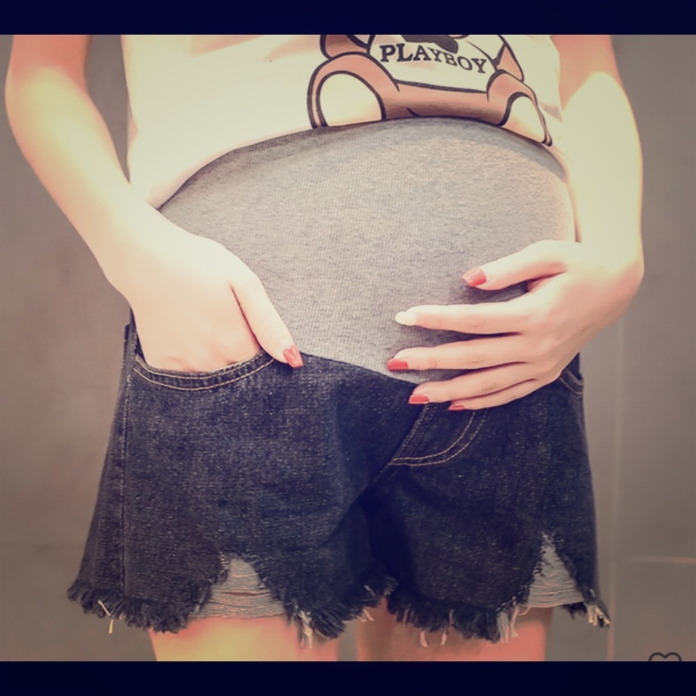 Black Patpat maternity distressed shorts.